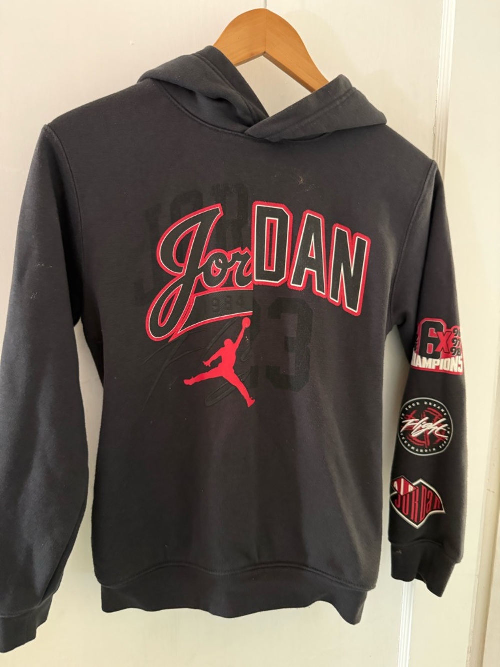 Youth Jordan Black Hoodie with Red & White Logo
